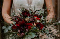 07 The wedding bouquet was lush and textural, with eucalyptus, thistles and lots of blooms and berries