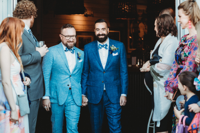 What gorgeous outfits the grooms chose for their big day