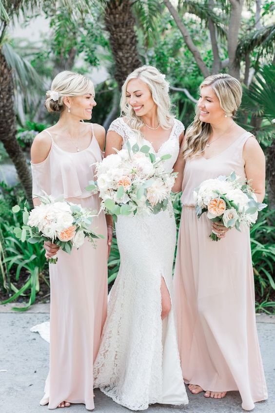 mismatching blush maxi bridesmaid dresses with slits and various necklines are a romantic and soft idea