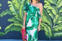 08 one shoulder tropical leaf print maxi dress with a side slit, hot pink wedges and a bright printed clutch plus tassel earrings