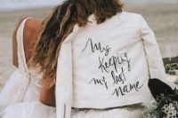 10 a white leather jacket with a fun inscription is a cool idea to wear for your wedding or for some shots
