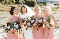 10 matching light pink midi wrap bridesmaid dresses with drapery and comfy sandals for a tropical wedding