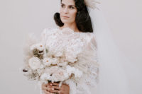 11 The bridal bouquet was all-white, with pampas grass and a neutral ribbon