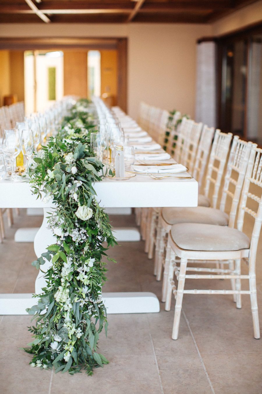 The wedding table runners were lush and extra long to add chic to the reception