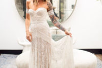 22 a stunning boho lace sheath wedding dress with a sweetheart neckline and matching arm band sleeves