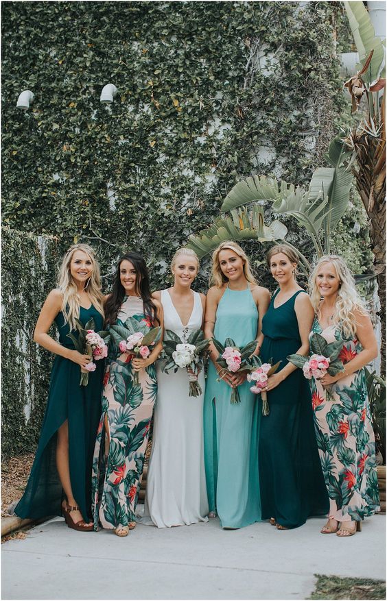 mismatching bridesmaid maxi dresses -  with floral prints, in dark green and light blue with different necklines