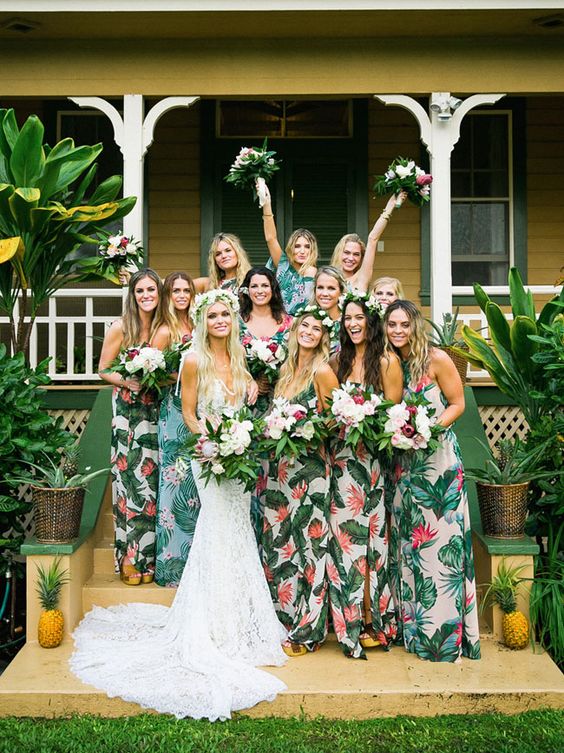 mismatching bold tropical print maxi dresses are great for a 70s tropical wedding