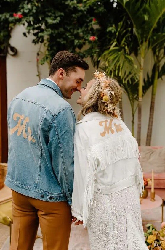 a blue denim jacket personalized with gold MR letters is a cool and easy DIY idea for a lovely groom's look