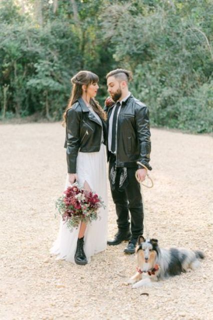 black leather jackets give a cohesive look to the couple and make it look bolder and cooler