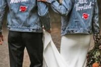 matching blue denim jackets with white calligraphy and hearts with the wedding date is a cool and chic idea