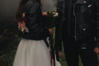 rock couple’s looks with black leather jackets, a floral one for the bride and a usual one for the groom
