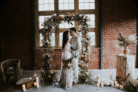 01 This luxurious bohemian wedding shoot is filled with trendy dried blooms, greenery and features chic boho wedding dresses