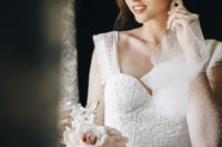 02 The bride was wearing a patterned wedding gown with fringe, sheer polka dot sleeves