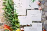 02 The wedding invitation suite was done with tropical elegance and calligraphy