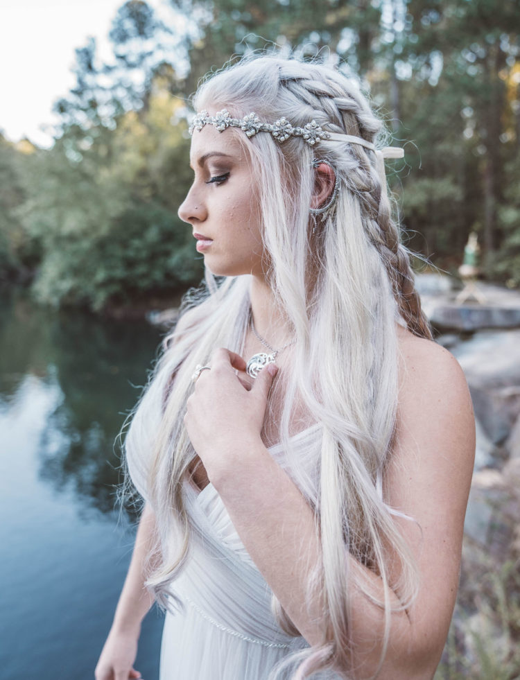this bridal look is inspired by the bridal look of Daenerys marrying drogo, with a braided half updo and a tender draped blush wedding dress