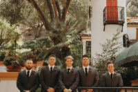 04 The groom and groomsmen were rocking grey three-piece wedding suits with black ties and burgundy boutonnieres