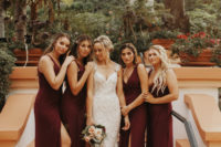 05 The bridesmaids were wearing burgundy wide strap maxi dresses with V-necklines