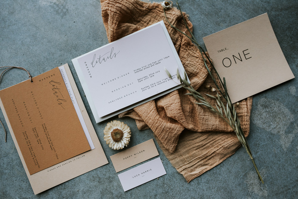 The elegant wedding stationery was done in earthy tones and with simple lettering
