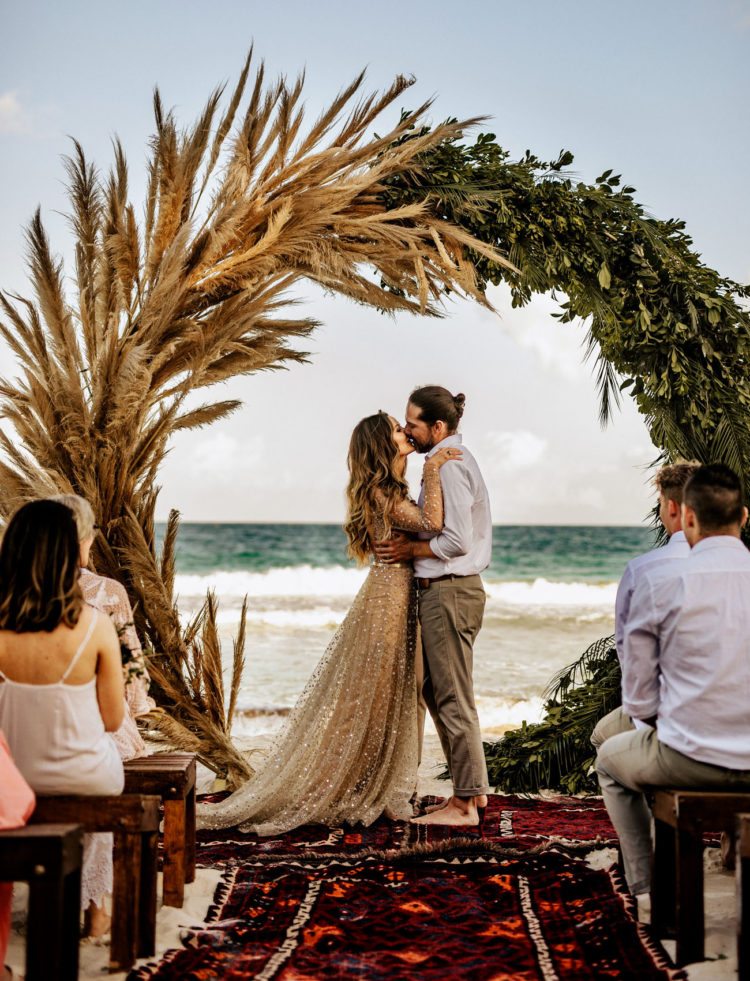 The ocean wedding backdrop was amazing for these nuptials