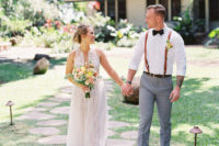 06 The groom was wearing grey pants, a white shirt, amber suspenders, a black bow tie and brown shoes