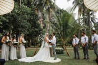 06 The second ceremony space was done with a triangle arch decorated with white florals and greenery and macrame rugs