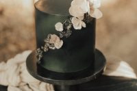 a stylish black wedding cake