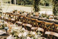 08 The reception was done outside, in a tent, there was lush greenery and colored glasses