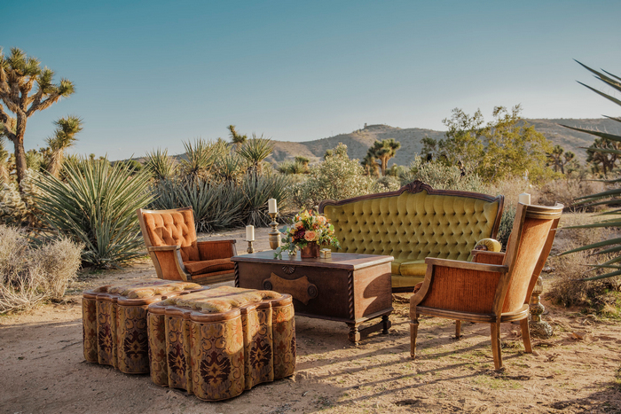 The wedding lounge was done with elegant vintage furniture in desert shades and a cool chest coffee table