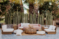 09 The second lounge was done in white and pink, rattan and wooden furniture and cacti around it