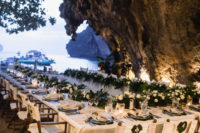 wedding tables decorated with tropical leaves