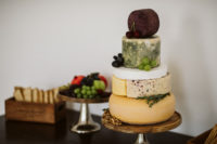 10 The wedding cake was skipped for a cheese wheel one, topped with fresh berries