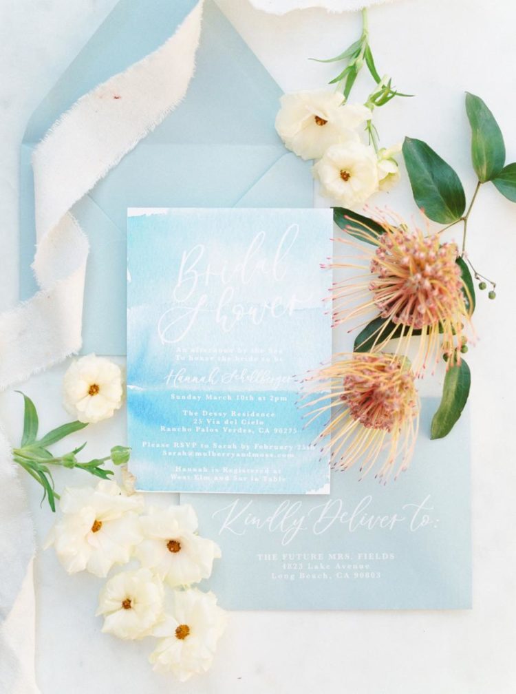 The wedding stationery was done in light and bright blues with much watercolor
