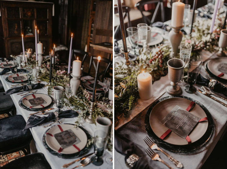 a modern moody GOTH tablescape with stone touches, black and grey candles, dark napkins and red ribbons
