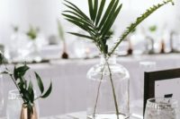 minimalist wedding centerpiece with greenery