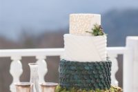 24 a gorgeous GOTH wedding cake with a gold crack, textural and green scale tier plus greenery and moss