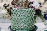 26 a green dragon scale wedding cake with a crown is a very cool GOTH inspired idea to try