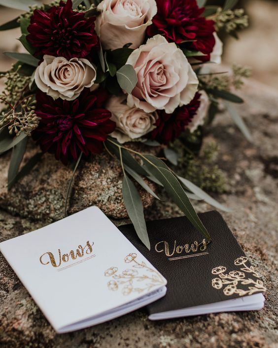 personalized vow books with decor will make your elopement more special