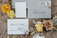 02 The wedding invitation suite was done in grey and white, with black calligraphy and insect prints