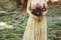 02 a beautiful gold lace wedding gown with a train, long sleeves and a V-neckline is a chic option for a forest bride