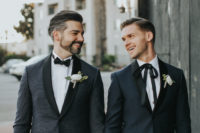 05 One groom preferred a navy tux with black lapels, a black bow and a white shirt, the other went for a printed black tux with black lapels and a bow tie