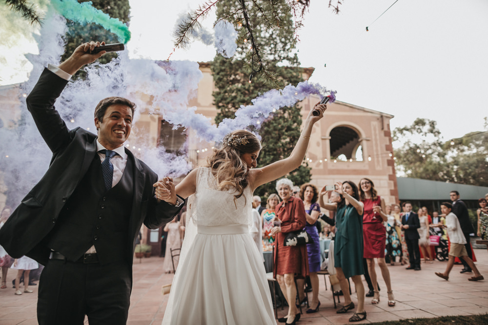 The couple had colorful smoke bombs for their portraits for a fun touch