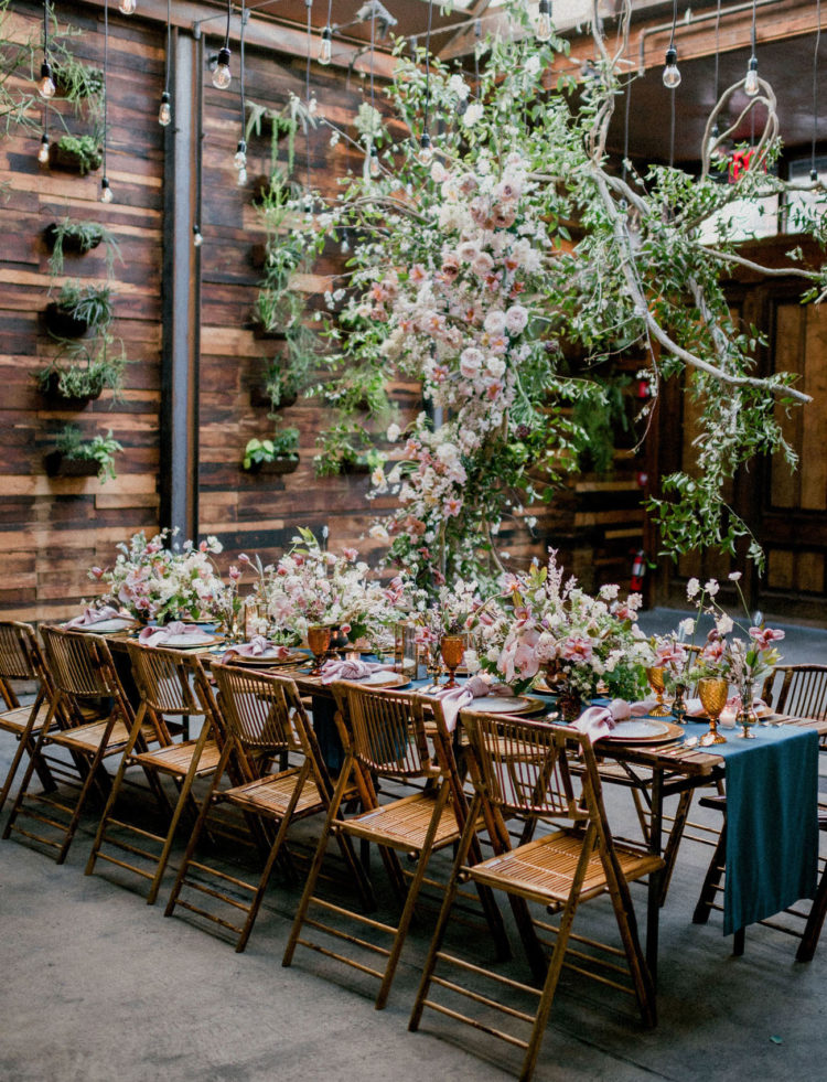 The reception space was done with lush white and pink blooms and greenery all over