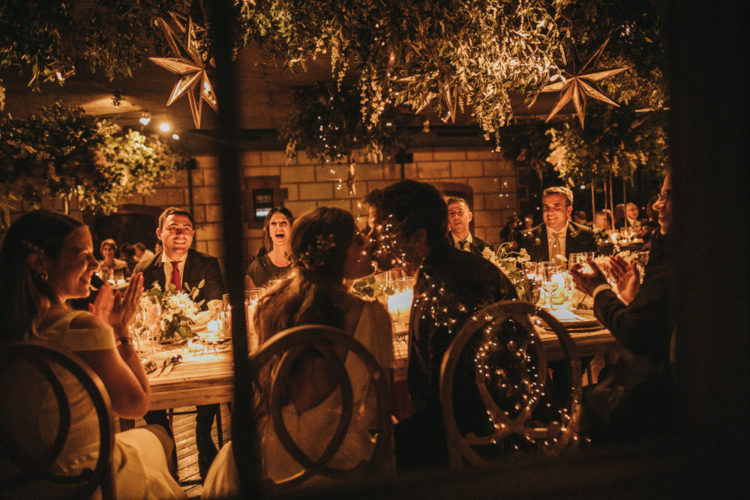 The wedding reception was a real gold jungle, with lights and lots of greenery and blooms