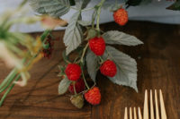 Fresh berries were added to the floral arrangements