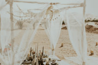 a boho picnic table setting for a wedding elopement shoot