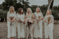 08 The bridesmaids were wearing neutral boho lace wrap dresses with bell sleeves and sashes