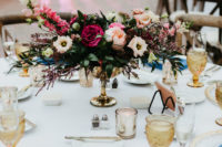 10 The wedding centerpieces were lush ones, in pink, blush, neutrals and textural greenery