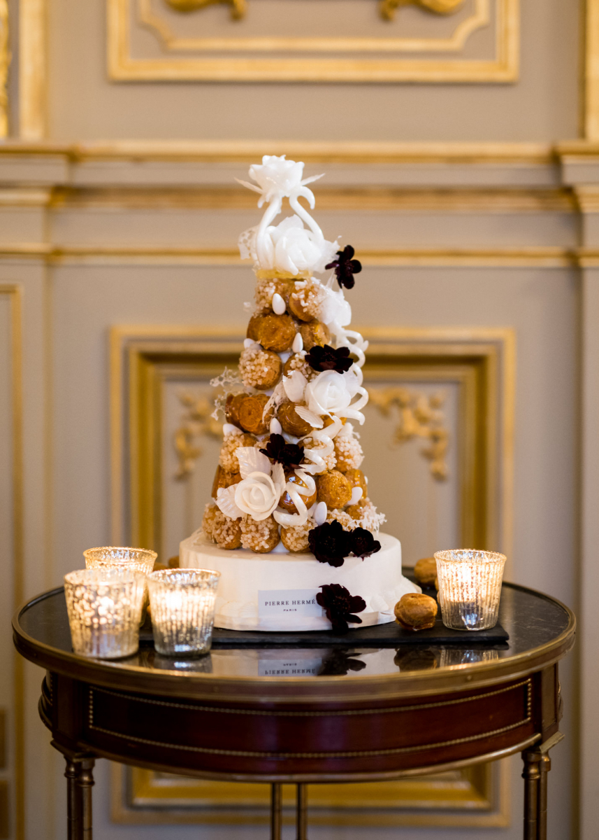 A wedding cake was substituted with a croquembouche to embrace the location