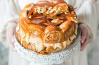 a cinnamon roll wedding cake with caramel shards and caramel drip is a fantastic option instead of a usual cake