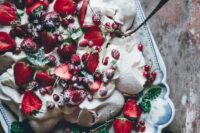 a summer berry pavlova is a delicious substitute for a usual wedding cake, and it looks gorgeous